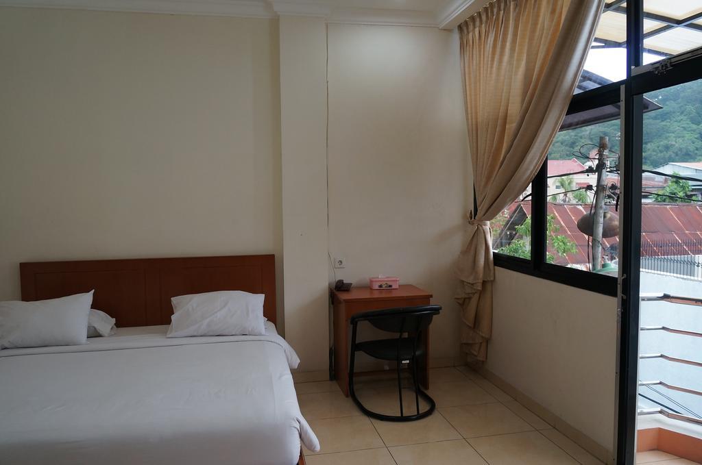 Jesnic Hotel Παντάνγκ Δωμάτιο φωτογραφία