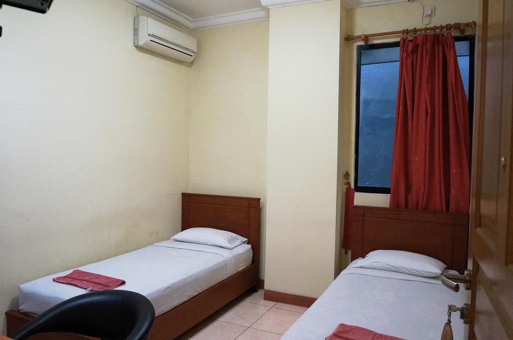 Jesnic Hotel Παντάνγκ Δωμάτιο φωτογραφία